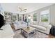 Relaxing living room includes comfortable seating, built-in bookshelves, and plenty of natural light at 645 Boundary Line Dr. Nw, Calabash, NC 28467