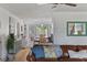Bright living room featuring hardwood floors and comfortable seating overlooking a lovely dining nook at 645 Boundary Line Dr. Nw, Calabash, NC 28467