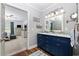 This is a view of the main bathroom from the doorway showcasing its layout and access to the main bedroom at 645 Boundary Line Dr. Nw, Calabash, NC 28467