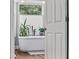 Close up of the modern stand alone tub with windows and a view at 645 Boundary Line Dr. Nw, Calabash, NC 28467