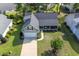 Aerial view of home showing well-manicured lawn, landscaping, and surrounding neighborhood at 672 Ashley Manor Dr., Longs, SC 29568