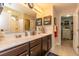 Bright bathroom featuring double vanity, marble countertops, and a separate walk-in shower at 672 Ashley Manor Dr., Longs, SC 29568