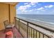 Relax on this condo balcony with ocean and beach views at 6900 N Ocean Blvd. # 1437, Myrtle Beach, SC 29572
