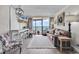 Living room boasts ocean views, stylish decor, and comfortable seating arrangements at 6900 N Ocean Blvd. # 1437, Myrtle Beach, SC 29572