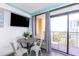 The dining area features a table with seating and an attached balcony with ocean views at 6900 N Ocean Blvd. # 710, Myrtle Beach, SC 29572