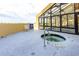 Outdoor hot tub on the patio featuring a pool, lounge furniture, and building in the background at 6900 N Ocean Blvd. # 710, Myrtle Beach, SC 29572