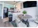 Bright kitchen area with modern appliances and a cozy dining space at 6900 N Ocean Blvd. # 710, Myrtle Beach, SC 29572