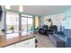 Inviting living room with a view from floor-to-ceiling windows and coastal decor at 6900 N Ocean Blvd. # 710, Myrtle Beach, SC 29572