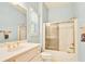 A charming bathroom with gold hardware and fixtures at 79 Windsor Circle Sw, Ocean Isle Beach, NC 28469