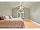 Bedroom with vaulted ceilings, natural light, and a ceiling fan at 79 Windsor Circle Sw, Ocean Isle Beach, NC 28469