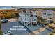 Exterior of the Ocean Ridge Beach Clubhouse with parking and partial ocean views at 79 Windsor Circle Sw, Ocean Isle Beach, NC 28469