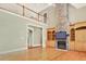 This living room is filled with natural light, stone fireplace, and built-in shelving at 79 Windsor Circle Sw, Ocean Isle Beach, NC 28469