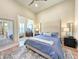 Serene bedroom with shiplap wall and a luxurious bed and elegant decor at 80 Landing Dr. # 80, Pawleys Island, SC 29585