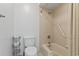 Tiled shower and tub combo with safety grab bar and toilet at 931 Cedarwood Circle, Myrtle Beach, SC 29572