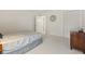 Serene bedroom featuring a comfortable bed, a dresser, and ample closet space, creating a relaxing retreat at 931 Cedarwood Circle, Myrtle Beach, SC 29572