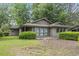 Well-maintained home with mature landscaping and a welcoming front entrance at 931 Cedarwood Circle, Myrtle Beach, SC 29572