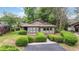 Charming single-story home featuring manicured shrubs and a well-maintained front yard at 931 Cedarwood Circle, Myrtle Beach, SC 29572