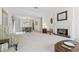Spacious living room with fireplace and open dining area; perfect for entertaining at 931 Cedarwood Circle, Myrtle Beach, SC 29572