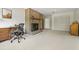 Office space featuring a brick fireplace and ample natural light at 931 Cedarwood Circle, Myrtle Beach, SC 29572