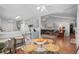 Bright dining area with a glass-top table and an abundance of natural light at 9607 Kings Grant Dr., Murrells Inlet, SC 29576