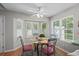 Bright dining area with a glass-top table and an abundance of natural light at 9607 Kings Grant Dr., Murrells Inlet, SC 29576