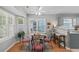 Bright dining area with a glass-top table and an abundance of natural light at 9607 Kings Grant Dr., Murrells Inlet, SC 29576