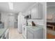 Bright kitchen features classic appliances, light countertops, and ample cabinet space for storage needs at 9607 Kings Grant Dr., Murrells Inlet, SC 29576