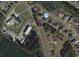 Aerial view of the property highlighting the location and surroundings at 100 Woodlyn Ave., Little River, SC 29566