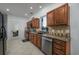 Updated kitchen with stainless steel appliances, granite countertops, and a view of the backyard at 100 Woodlyn Ave., Little River, SC 29566