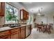 Kitchen with granite countertops, stainless steel appliances, and a breakfast nook with a view at 100 Woodlyn Ave., Little River, SC 29566