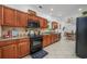 Well-equipped kitchen with stainless steel appliances, granite countertops, and ample cabinetry at 100 Woodlyn Ave., Little River, SC 29566