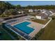 Beautiful community pool surrounded by lush landscaping and manicured lawns at 100 Woodlyn Ave., Little River, SC 29566