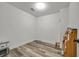 Finished basement area features wood-look floors, white walls, and extra storage space at 101 Culpepper Way # 1007, Myrtle Beach, SC 29579