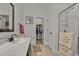 Neutrally decorated full bathroom with glass shower and walk-in closet at 101 Culpepper Way # 1007, Myrtle Beach, SC 29579