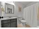 Clean bathroom features a framed mirror, a single sink vanity, and a shower-tub combination at 101 Culpepper Way # 1007, Myrtle Beach, SC 29579
