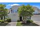 Charming townhome with a well-manicured lawn and an attached single-car garage offers inviting curb appeal at 101 Culpepper Way # 1007, Myrtle Beach, SC 29579