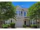 Inviting townhome featuring a balcony, lush landscaping, and an attached one-car garage at 101 Culpepper Way # 1007, Myrtle Beach, SC 29579