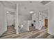 Second floor hallway with luxury vinyl plank flooring and neutral colored walls at 101 Culpepper Way # 1007, Myrtle Beach, SC 29579
