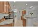 Bright kitchen featuring tile flooring, stainless steel appliances, and a breakfast bar area at 101 Culpepper Way # 1007, Myrtle Beach, SC 29579