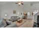 Open-concept living room seamlessly connects to the dining area and kitchen, creating an inviting space at 101 Culpepper Way # 1007, Myrtle Beach, SC 29579