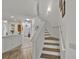 Staircase with wooden steps and white risers, leading to the upper level of the home at 101 Culpepper Way # 1007, Myrtle Beach, SC 29579