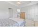 Serene main bedroom showcases ample storage, complemented by a king bed and ensuite bathroom access for ultimate convenience at 10106 Duval Dr., Murrells Inlet, SC 29576