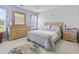 Calming main bedroom with elegant decor, featuring a king-size bed and ample storage space, creating a comfortable retreat at 10106 Duval Dr., Murrells Inlet, SC 29576
