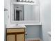 Compact bathroom with sink, vanity and large mirror at 1100 Possum Trot Rd. # B202, North Myrtle Beach, SC 29582