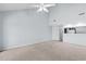Bright living room with vaulted ceiling, and open view to the breakfast bar and kitchen area at 1100 Possum Trot Rd. # B202, North Myrtle Beach, SC 29582