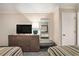 Bedroom featuring two beds, television, bench, and mirror at 1105 S Ocean Blvd. # 420, Myrtle Beach, SC 29577
