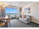 Cozy living room with a comfortable couch and balcony offering ocean views at 1105 S Ocean Blvd. # 420, Myrtle Beach, SC 29577
