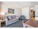 Comfortable living room featuring a sitting area, well-lit interiors, and view to other rooms at 1105 S Ocean Blvd. # 420, Myrtle Beach, SC 29577
