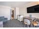 Inviting living room featuring a dining area, television, and well-maintained interiors at 1105 S Ocean Blvd. # 420, Myrtle Beach, SC 29577