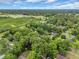 Expansive aerial view of a residential community surrounded by greenery and trees at 1108 Chicora Blvd., Conway, SC 29526